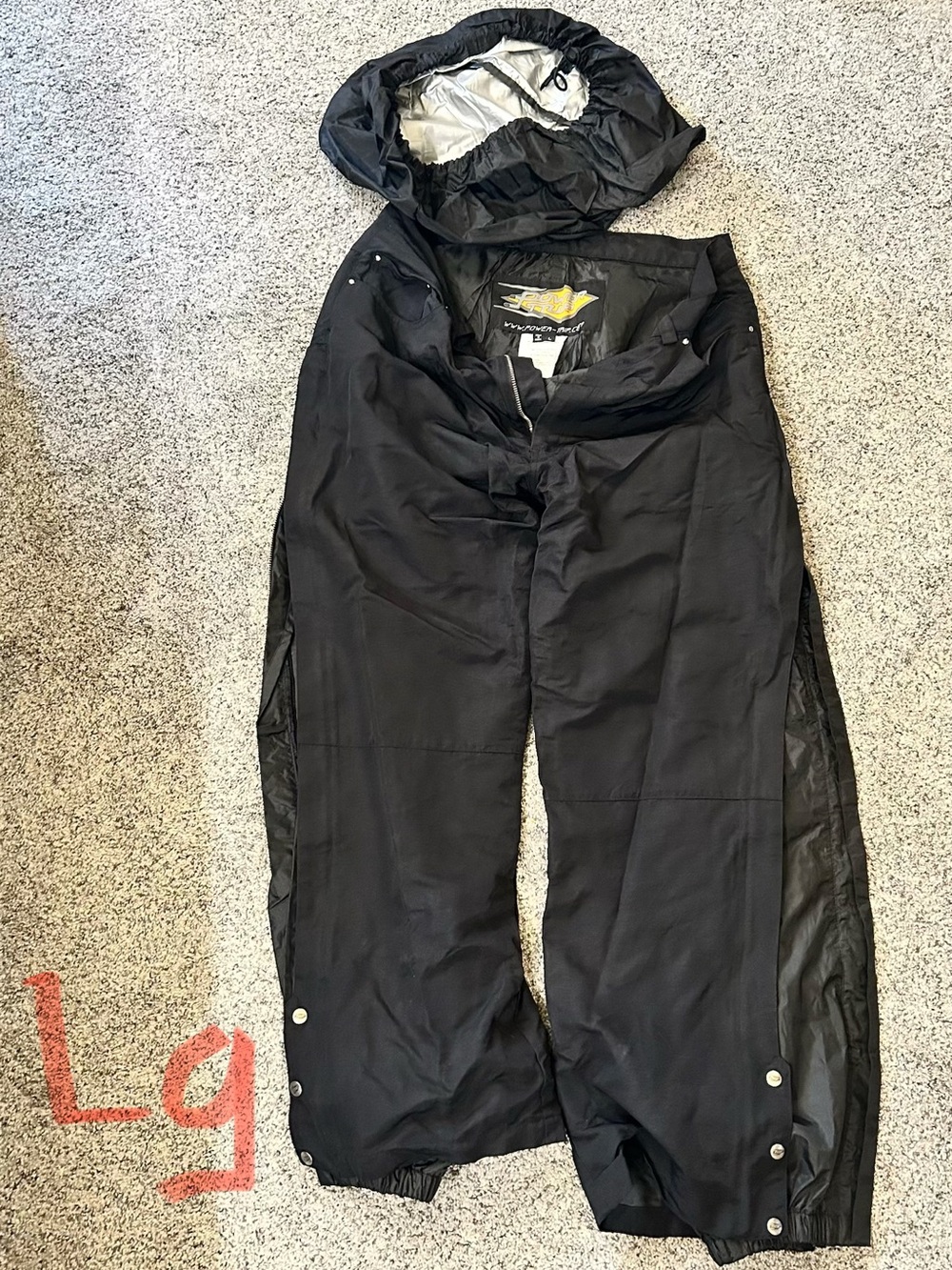 Black Insulated Rain/ Snow Pants with bag.